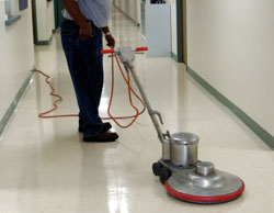 Person cleaning the floor