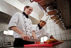 two people working hard